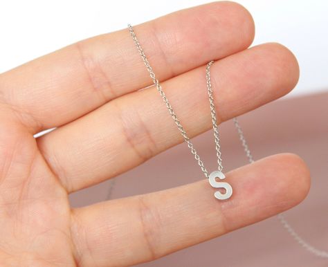 Initial Necklace Silver PERSONALIZED Necklace with Silver Plated Chain and Tiny Silver Plated Initial-Letter Charm. The listing is for ONE alphabet Necklace. For a minimal look!! This is a beautiful dainty necklace, so cute and delicate, you can wear it alone or stack it with your other necklaces!! If you want 4 or more necklaces contact me for a discount!! ✪ Silver Plated Delicate Chain. Length 16.5''/42cm or ask me for other size ✪ Matt Silver Plated Tiny Initial-Letter. 5mm*7mm. Make you cust S Initial Necklace Silver, Letter Charm Necklace, Initial Necklace Silver, Initial S, Alphabet Charm, Monogram Bracelet, Alphabet Necklace, Christmas Gifts For Sister, S Necklace