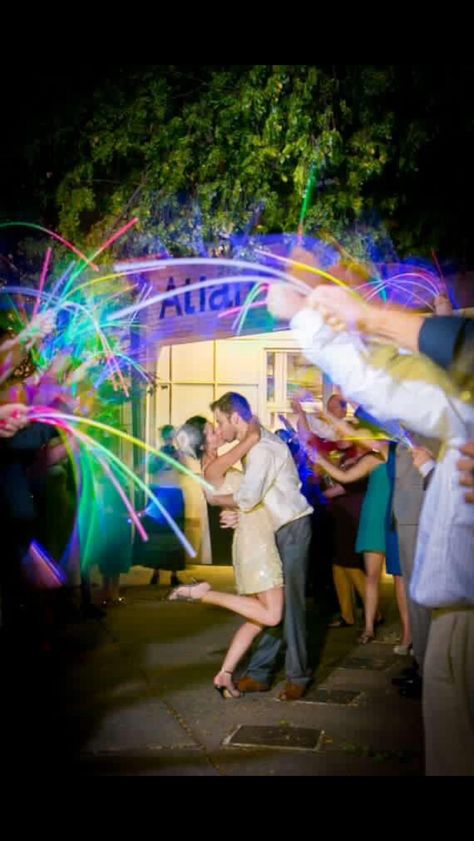 Glow sticks for the grand exit. #wedding #grandexit #glowsticks Wedding Exit Ideas, Glow Stick Wedding, Night Wedding Photos, Wedding Exit, Wedding Send Off, Sparkler Send Off, Wedding Exits, Boda Mexicana, Practical Wedding