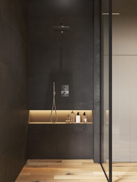 This modern bathroom has a horizontal shower niche with hidden lighting for storage. #ModernBathroom #ShowerNiche #ShowerNicheIdeas #BathroomStorage Drømme Bad, Teak Bathroom Vanity, Modern Loft Apartment, Dekorere Bad, Bathroom Niche, Teak Bathroom, Toilette Design, Hidden Lighting, Bathroom Lights