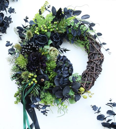 This unique Halloween flower wreath features a great mix of flowers and greenery. It can be a great addition to your front door or wall decor in any room. Made on a wicker base and is embellished with faux roses, hydrangea, berries and leaves in varying shades of green. Size: up to 16"/41cm cm with greenery, 14"/35cm base  up to 20"/51cm with greenery, 16"/40cm base HOW TO ORDER: Select your desired style: - wreath + wooden 'welcome' sign painted in the color of your choice [shown here: gold] Gothic Front Door, Black Wreaths, Black Halloween Wreath, Front Door Decorations, Halloween Door Wreaths, Outdoor Wreath, Halloween Front Doors, Black Wreath, Autumn Wreaths For Front Door