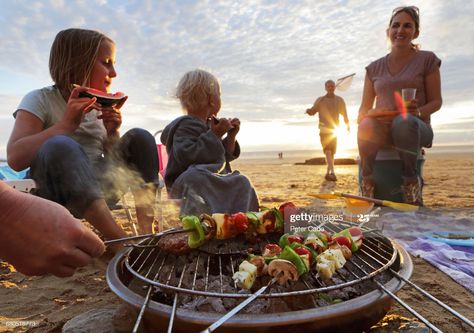 Stock Photo : Family having BBQ on beach at sunset Family Bbq Aesthetic, Bbq Aesthetic, Beach Barbecue, Spain Beach, Portable Barbecue, Family Bbq, Beach Bbq, Beach At Sunset, Bank Holiday Weekend