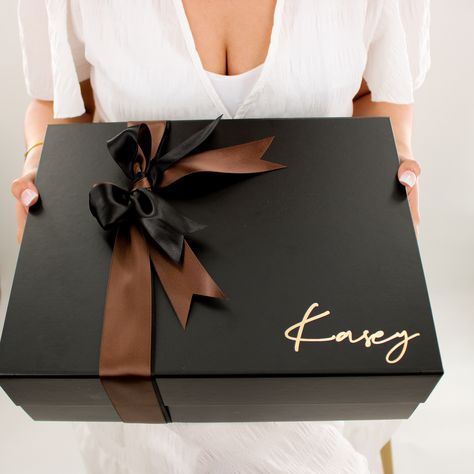 Looking for a gift box that exudes luxury and elegance? Look no further than our Black Luxury Magnetic Gift Box with Lace. This large, personalized gift box is perfect for all occasions, from birthdays to weddings and everything in between. The rich black color adds a touch of sophistication, while the magnetic closure ensures that your precious gifts are securely stored inside. The elegant ribbon bow adds an extra layer of beauty and makes it ready to present to your loved ones. Not only is thi Black Box With Ribbon, Luxury Box Design, Empty Gift Box, Empty Gift Boxes, Creative Birthday Cards, Gift Box With Ribbon, Magnetic Gift Box, Large Gift Boxes, Box With Ribbon