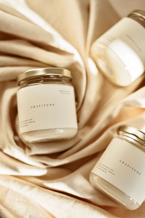 Hand poured soy candles by A White Nest with labels and photography done by Magnolia Marketing. Classic and minimal label design. Minimal Label Design, Candle Pics, Candle Photography Ideas, Layered Candles, Candle Logo Design, Candle Photoshoot, Candle Packaging Design, Minimal Candles, Candle Picture