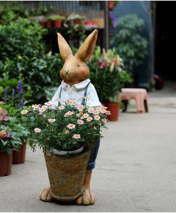 Garden flower pot, decoration flower pot, outdoor flower planter, flower pot design, indoor flower pots, modern flower planter, create flower pots, unique flowerpots, ceramic flower pot, animal flower pot, garden ornaments, garden decoration, modern flower pot Bunny Flower Pot, Garden Statues For Sale, Statue For Garden, Garden Animal Statues, Easter Porch Decor, Rabbit Statue, Rustic Outdoor Decor, Bunny Flower, Courtyard Ideas