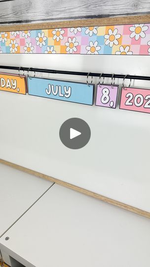 82K views · 5.6K reactions | ☁️ Let’s make a flip calendar! ☁️  Flip calendars are a great way to show the date without having to write every single day!   I use a magnetic shower curtain rod and binder clips to put it all together. This printable set matches perfectly with my Pastel Dreams Classroom Decor. It includes this funky font and a traditional primary font. But it is totally text editable through PowerPoint to change the font or language.   👇 Comment “calendar” below and I will DM you a link.   #classroom #classroomideas #classroomdecor #classroompinspirations #teachers #teachersofinstagram #pastelclassroom #teachertips #teachertipsandtricks | Kim McNeil | Classroom Decor 🌿 | Mentol · Yellow Flip Calendar Classroom, Welcome To My Classroom, Flip Calendar, Funky Fonts, Classroom Calendar, Shower Curtain Rod, Flip Chart, Flipped Classroom, Binder Clips