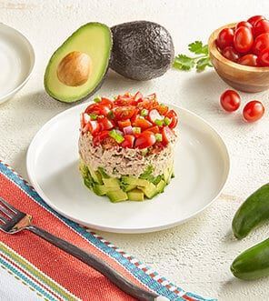 Avocado & Tuna Tomato Salad Stack - Avocados From Mexico Seafood Stack, Avocado Snacks, Tuna Tomato, Avocado Recipes Healthy, Avocado Tuna, Fish Entrees, Avocados From Mexico, Avocado Tuna Salad, Tuna Avocado