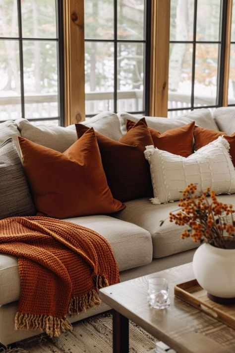 Burnt Orange Couches Living Room, Burnt Orange Pillows On Grey Couch, Brown And White Fall Decor, Dark Color Decor, Rustic Orange Home Decor, Brown And Burnt Orange Living Room, Tan And Rust Living Room, Orange Rustic Living Room, Burnt Orange Apartment Decor