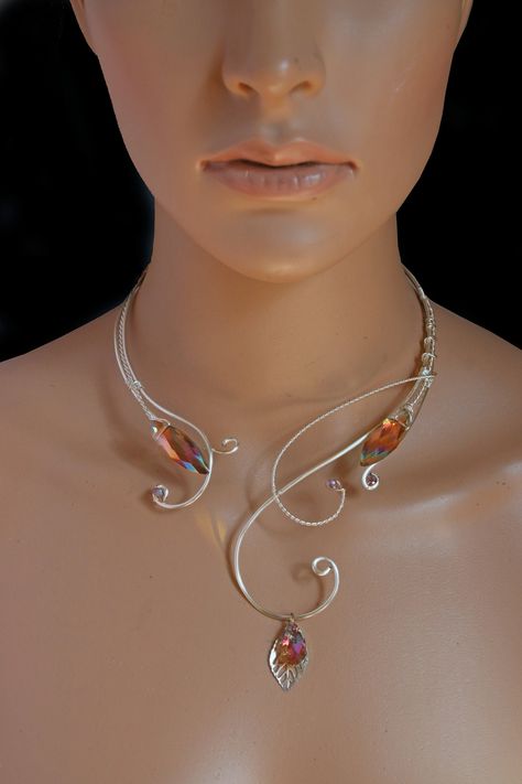 "ELVEN NECKLACE , elvish necklace ,torc , crystal necklace , elven jewelry , medieval necklace , elven jewelry A unique, silver elven torc necklace that looks amazing dressed up or down! Looks great with formal wear for an elegant look akin to an elven queen. This piece adds a touch of historical romance to casual outfits for an unexpected touch of whimsical charm! Quite befitting for medieval \\ renaissance \\ fantasy styles! **MADE TO ORDER** (please allow 3-5 days for construction prior to sh Fantasy Necklace Art, Necklace Fantasy Art, Elvish Necklace, Fantasy Jewelry Necklace, Unique Necklace Designs, Torc Necklace, Elven Necklace, Elven Queen, Medieval Necklace