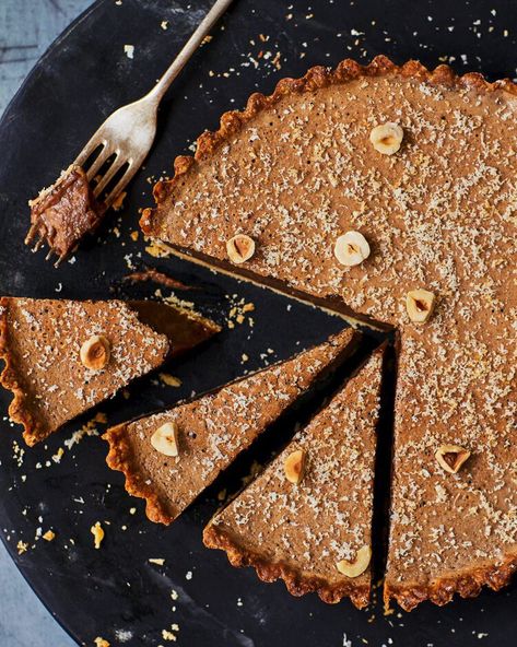 Ravneet Gill's gianduja chocolate tart Christmas Chocolate Recipes, Chocolate Tarts Recipe, Italian Chocolate, Italian Recipes Dessert, Hazelnut Cake, Delicious Magazine, Chocolate Hazelnut Spread, How To Roast Hazelnuts, Christmas Food Desserts