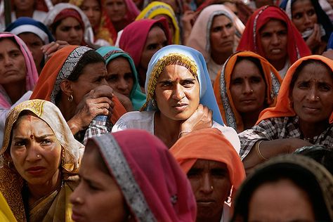 Women at village meeting, India. 'In much of the rural majority world, women do most of the farm work, while men make most of the decisions,' says the Hard Rain Project. 'The men are usually listed as owning the land, but they often work elsewhere. So when government agents come calling with a training programme or credit scheme, they ignore the women running the farms because their names are not on government lists. ' Earth Exhibition, Farm Work, Rural Women, Women Working, Whole Earth, Women Running, Bob Dylan, Running Women