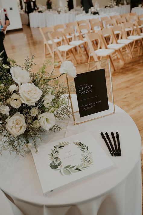 Black Tie Wedding with simple modern guest book table. #blacktiewedding #luxewedding #guestbook #guestbooktable #modernguestbooktable #guestbookideas #weddingreception #weddingdesign #modernweddingideas #modernweddinginspo #modernwedding #blackandwhitewedding #whiteflorals #whiteweddingflowers #weddinginspo #weddinginspiration Modern Wedding Guest Book Table, Wedding Guest Book Display, Guest Book Sign In Table Wedding Ideas, Guest Book Display Table, Wedding Sign In Table Decor, Simple Guest Table Wedding, Modern Wedding Gift Table, Guest Book Table Sign, Wedding Side Table Ideas