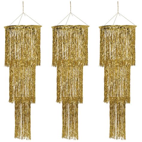 PRICES MAY VARY. INCLUDES: 3 Gold Shimmering Chandelier Decorations in the package SIZE: Each Hanging Chandelier Decoration measures 4 feet long MATERIALS: Made of gold plastic and has gold cord at the top for hanging PERFECT FOR: New Year's Eve Party Decorations and Great 20's Party Décor CELEBRATE LIFE WITH US: Since 1900 The Beistle Company’s mission has remained the same: to help people around the world celebrate life’s events by creating fun, high quality products using the finest materials Hanging Gold Chandelier, Photo Balloon Chandelier, Gatsby Cocktail Table, Golden Gates Prom Theme, Star Theme New Year Eve. Table, Great Gatsby New Year Party, Cubicle For New Years, Gold Chandelier Amazon, White And Gold Party New Ywars