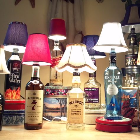 DIY Bottle Lamp. This would make such a cool gift for anyone who has a home bar, especially if you use a bottle of the recipient's favorite liquor or wine or a unique, or especially decorative bottle. Liquor Bottle Lamp, Liquor Bottle, Bottle Lamp, Liquor, Lamps