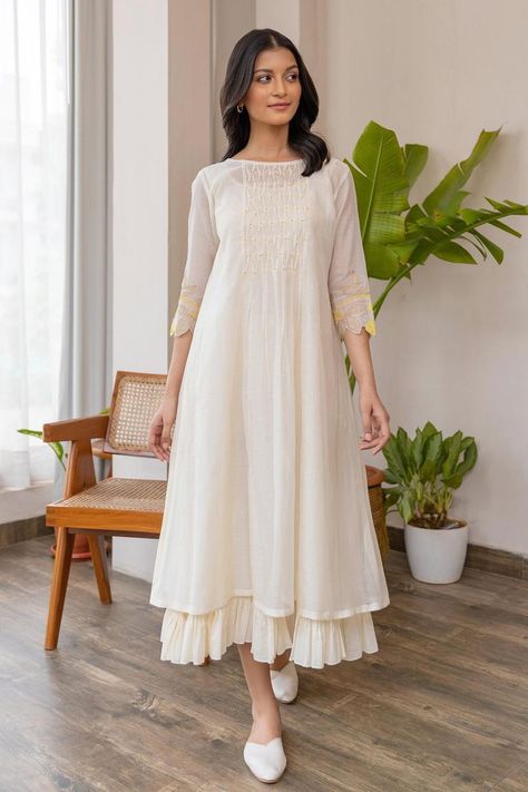 Buy off-white #chanderi #dress with smock pattern on yoke & yellow applique embroidered #floral motifs on sleeve at #AzaFashions Shop online now at #Azafashions.com Call +91 8291990059 or email contactus@azafashions.com for enquiries. #wedding #festive #ethnic #tradional #shopping #shoponline #party डिजाइनर कपड़े, Simple Frock Design, Simple Frocks, Casual Frocks, Anarkali Dress Pattern, Simple Kurta Designs, Simple Kurti Designs, Frock For Women, Long Dress Design