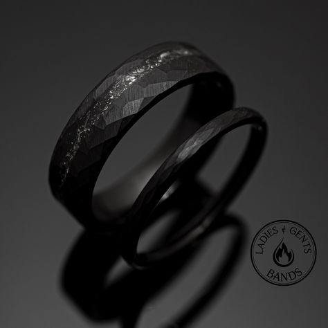 Your wedding ring set order includes + One 6mm Black Hammered Obsidian-styled tungsten Wedding Band with Meteorite inlay + One 2mm Black Hammered Obsidian-styled tungsten Wedding Ring + Both Come inside Wax Sealed Ring Boxes. Limited Time: Free Matching Set of Black Silicone Bands w/ Order. + 1 YEAR WARRANTY for your Bands. *Durable - Incredibly Scratch-Resistant to always look great. *Comfort-fit & Weighty - Designed to fit well and feel good in your hand. *Made to order - Every ring we ship is unique and one-of-a-kind. *6mm - Most popular standard width for men *2mm - Most popular standard width for women *Hypoallergenic - No discomfort from metals. *Cobalt-Free - Will never turn your finger green or irritate. *Each buyer, a friend - Any issues? We'll take care of you. Message us, we ans Black Ring For Men Titanium Wedding Bands, Obsidian Ring Mens, Black Men Wedding Ring, Black Wedding Bands His And Hers, Wedding Ring Black Women, Black Wedding Bands For Men, Black Wedding Rings For Men, Black Wedding Ring Sets, Wax Seal Ring