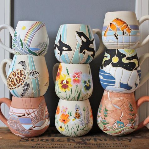 Leah 🇨🇦 on Instagram: "Bisque stack - which is your fav? Sale update - these mugs need to be glazed and fired (they go in on Friday). I will be announcing a shop restock date after they come out of the kiln. Thank you for your patience 🧡" Animal Pottery Painting Ideas, Pottery Party, Pottery Carving, Mug Painting, Beautiful Kitchenware, Pottery Patterns, Clay Works, Ceramics Inspiration, Ceramic Inspiration