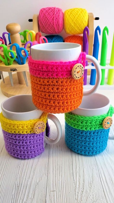 This crochet mug cozy is easy and quick to make to wrap around your coffee and tea cups plus has a crocheted bottom section to serve as a built in coaster. #reels #crochet #knitting #coffeelover #cozy #tutorial #howto #yarn #artist #colorful #naztazia | Naztazia | Naztazia · Original audio | Crochet mug cozy is easy and quick to make to wrap around your coffee and tea cups plus has a crochet bottom section to serve as a built-in coaster. Diy Lace Sleeves, Diy Crochet Headband, Crochet Tea Cup, Change Colors In Crochet, Mug Cover, Crochet Star Stitch, Crochet Mug, Crochet Mug Cozy, Pumpkin Applique