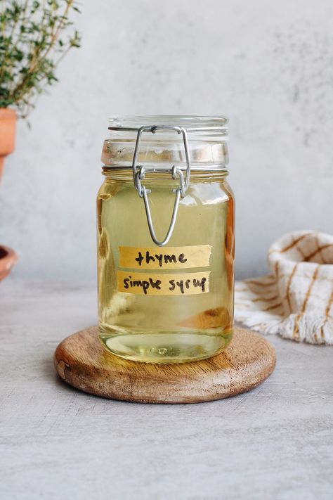 Thyme Simple Syrup is a great way to use up extra herbs or a great reason to buy herbs! It's a tasty, sweet, herbaceous way to liven up drinks like lemonade, tea or cocktails. Thyme even has medicinal properties and is often used to treat respiratory ailments! It only takes about 15 minutes to make too! #thymesimplesyrup Thyme Simple Syrup, Mediterranean Pasta Salad, Ginger Lemon Tea, Mediterranean Pasta Salads, Pasta Salad Ingredients, Mediterranean Pasta, Red Wine Vinaigrette, Simple Syrup Recipes, 3 Ingredient Recipes