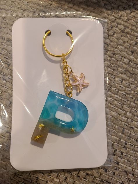 Beautiful beach themed letter P keychain with charm. P Letter, Letter Keychain, Yucca Valley, Letter P, Cute Disney Wallpaper, Beach Theme, Beach Themed, Cute Disney, Disney Wallpaper