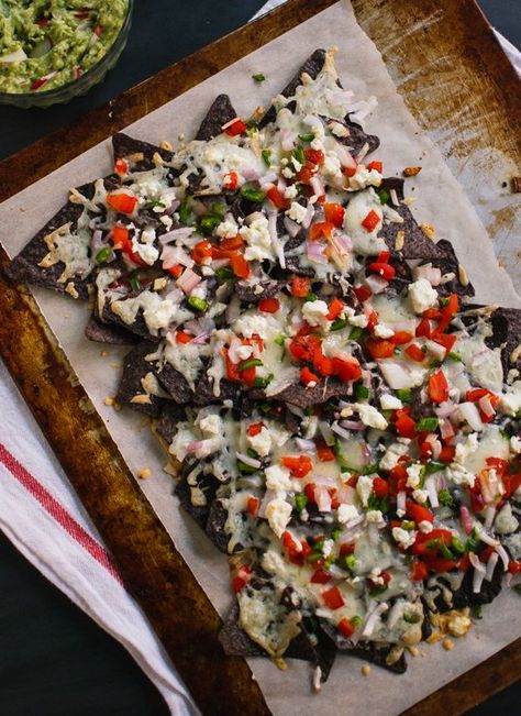 vegetarian blue corn nachos Corn Nachos, Vegan Mexican Food, Homemade Guac, Blue Corn Chips, Vegetarian Mexican Recipes, Vegetarian Nachos, Homemade Guacamole Recipe, Vegetarian Mexican, Vegan Mexican Recipes