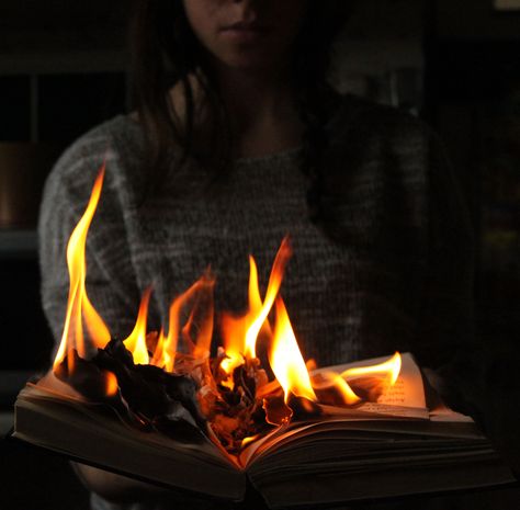 Burning book by Angela Harrington Book On Fire Photography, Burning Book Photography, Burn Book Photoshoot, Burning Paper Aesthetic, Book On Fire, Burning Paper, Storybook Cosmetics, Book Burning, Paper Aesthetic