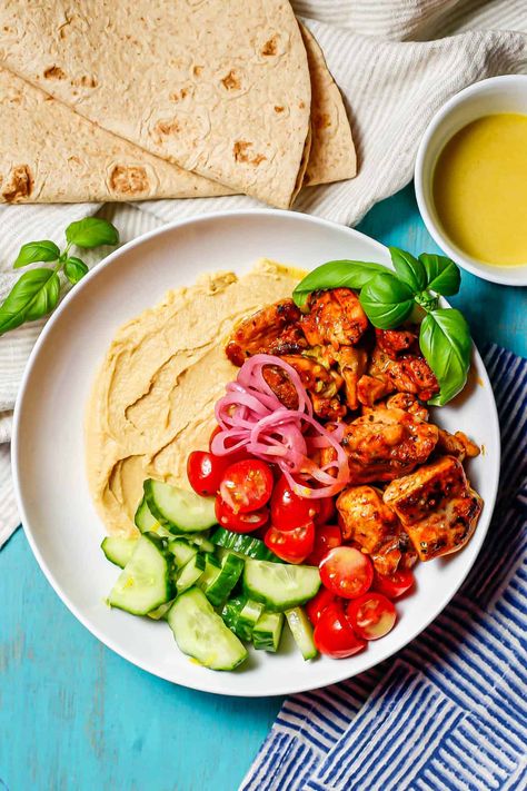 Chicken hummus bowls with tender chunks of chicken, creamy hummus, fresh veggies and a light, lemony vinaigrette are a healthy, hearty lunch or dinner. Chicken Hummus Bowl, Lemony Vinaigrette, Hummus Bowls, Veggie Roll Ups, Chicken Hummus, Hummus Chicken, Hummus Bowl, Creamy Hummus, Hummus And Pita