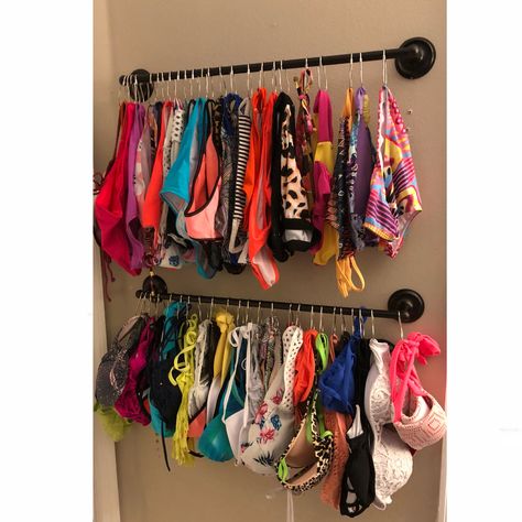 I organized my swimsuits using a towel bar from Walmart ($12) and basic shower hooks ($0.97 for a 12 pack) I got those at Walmart too! I’ve been searching for a way to organize my bikinis and one pieces for a long time! This was cheap, beautiful, and simple! Bra Organization Ideas Closet, Swimwear Organization Ideas, Bathing Suit Closet Organization, Bathing Suit Display Ideas, How To Store Swimsuits In Closet, Organize Swimsuits Ideas, Organize Bikinis, How To Organize Swimwear, How To Store Bathing Suits