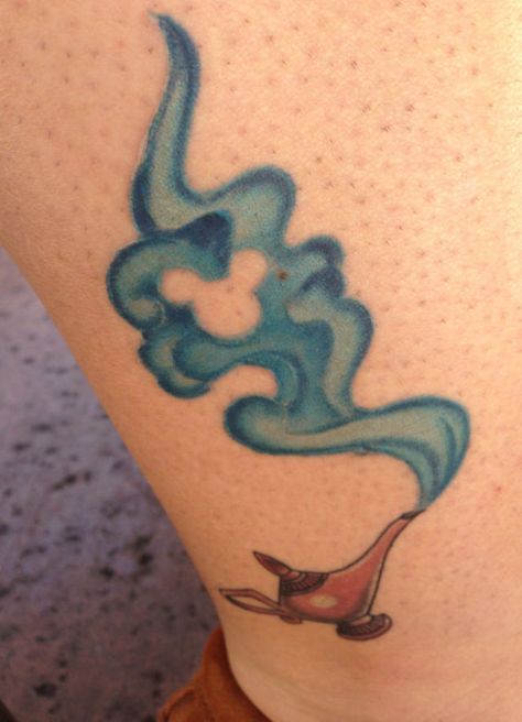 17 Magical Disney Tattoos That Look Straight Out Of Wonderland | Playbuzz Genie Lamp Tattoo, Genie Tattoo, Aladdin Tattoo, Disney Inspired Tattoos, Lamp Tattoo, Disney Sleeve, Tattoo Zeichnungen, Tattoos Geometric, Disney Tattoo