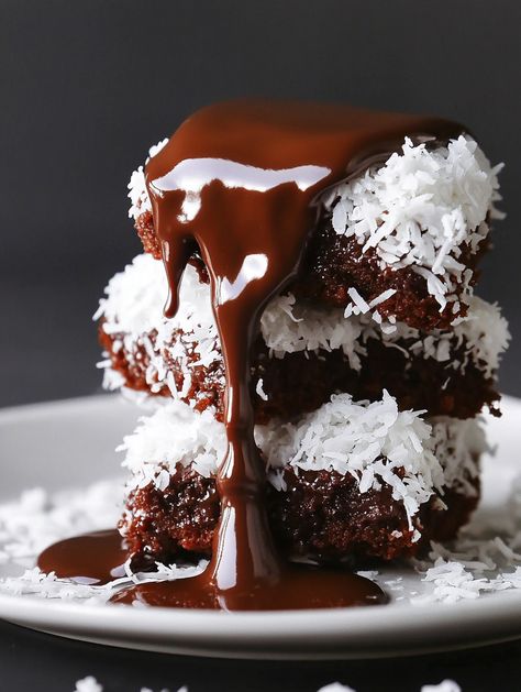 Australian Lamingtons recipe   👌 𝗜𝗻𝗴𝗿𝗲𝗱𝗶𝗲𝗻𝘁𝘀 👌  - 1 1/2 cups (190g) all-purpose flour - 1 cup (200g) granulated sugar - 1/2 cup (115g) unsalted butter, softened - 2 large eggs - 2 teaspoons baking powder - 1/2 teaspoon salt - 1/2 cup (120ml) milk - 1 teaspoon vanilla extract - 1 cup (120g) desiccated coconut Australian Lamingtons, Lamingtons Recipe, Desiccated Coconut, Recipe Ingredients, Granulated Sugar, Food Recipe, Unsalted Butter, 2 Cups, Purpose Flour