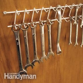 Hang wrenches on a tie/belt rack Are all your wrenches stuffed in a plastic bucket? Heres a better idea. Screw a tie/belt rack (available at discount stores) to a bare spot on the wall over your workbench and hang the wrenches—SAE and metric—where you can swiftly nab and put them away in an orderly fashion Belt Rack, Clever Organizer, Tie Rack, Garage Organize, Garage Tools, Shop Organization, Family Handyman, Tool Sheds, Diy Garage