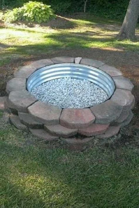 Use the galvanized steel for fire pit and stack the bricks to create this remarkable fire pit in the garden. This DIY design is never gets old. Cheap Fire Pit, Outside Fire Pits, Deck Fire Pit, Outdoor Fire Pit Designs, Fire Pit Ring, Walkway Ideas, Fire Pit Furniture, Pergola Design, Patio Fire Pit