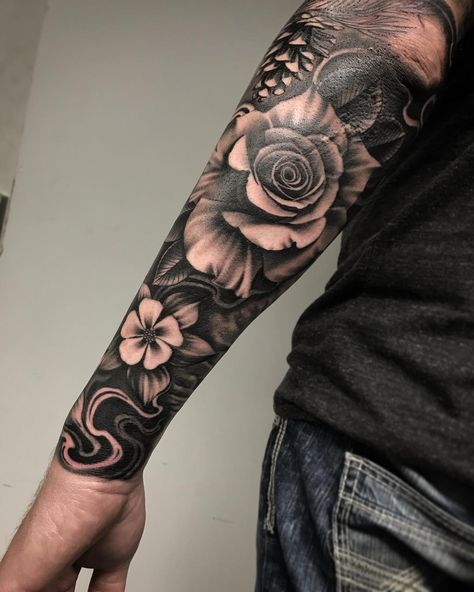 Floral tattoos can also be masculine fellas don’t think roses are just for the ladies. 😉  Artis Rosen Tattoo Mann, La Muerte Tattoo, Tattoo Avant Bras, Roses Tattoos, Men Flower Tattoo, Rose Tattoo Sleeve, Female Tattoos, Floral Tattoos, Full Arm Tattoos