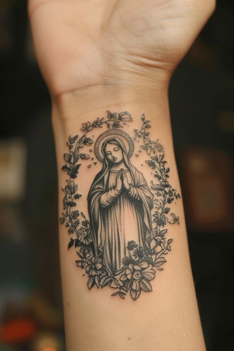 Unique Virgin Mary Tattoo Ideas to Honor Faith Virgin Mary Arm Tattoo, Virgin Mary Rosary Tattoo, Virgin Mary Tattoo For Women, Mary Tattoos Catholic, Small Virgin Mary Tattoo, Roman Catholic Tattoos, Tattoo Arm Ideas, Virgin Mary Tattoos, Virgen Mary Tattoo