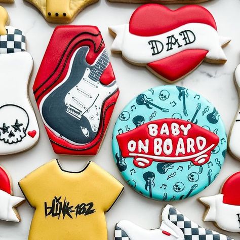 Mandy Edmunds on Instagram: "Have you ever seen baby shower cookies that rocked so hard? 👶🏻🤘🏻 These new parents requested a “Vans Warped Tour” theme, complete with band t-shirt onesies, classic checkered Vans, and electric guitars. So fun!

#sugaredupcookies

#customcookies #babyshowercookies #punkrockcookies #punkrock #rocknrollbaby #babyonboard #vanswarpedtour #warpedtour #warpedtourcookies #vanscookies #thevandals #blink182 #rancid #nofx #guitarcookies #vansshoes #hearttattoo #tattoocookies" Rockstar Baby Shower Ideas, Edgy Baby Shower Theme, Skater Baby Shower Ideas, Warped Tour Baby Shower Theme, Born To Rock Baby Shower Ideas, Rock N Roll Baby Shower Ideas, Vans Warped Tour Birthday Party, Emo Baby Shower Ideas, Vans Baby Shower Theme