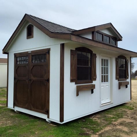 WOODTEX ~ 10x16 Country Cottage ~ It has Barn White walls with Chestnut Brown Urethane stain on the trim and weathered wood shingles. Brown Shed Ideas, White House Brown Trim, Weathered Wood Shingles, White Shed, Shed Homes Ideas, Stained Wood Trim, Shed Design Plans, Farmhouse Style Exterior, Shed Designs