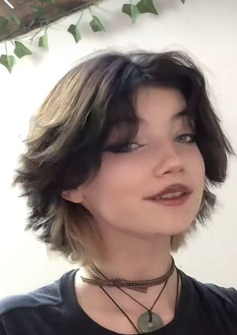 Wolf cut is a tapered haircut with a choppy short layers that start at the crown and gradually get longer toward the end. The haircut is defined by its heavy layers and the volume at the crown and looks like a mixture of shag and mullet. Haircut inspired by Mikasa Ackerman #pixiebobhaircut #hairology https://youtu.be/lc9jcog75Nc Wolf Cut For Girls Short, Short Wolf Cuts With Bangs, Cute Short Fluffy Haircuts, Tomboy Hairstyles Wolfcut, Short Wolf Hair With Bangs, Short Fluffy Haircuts For Women, Anime Haircut Women Short, Fluffy Wolf Cut Short, Short Haircuts Fluffy