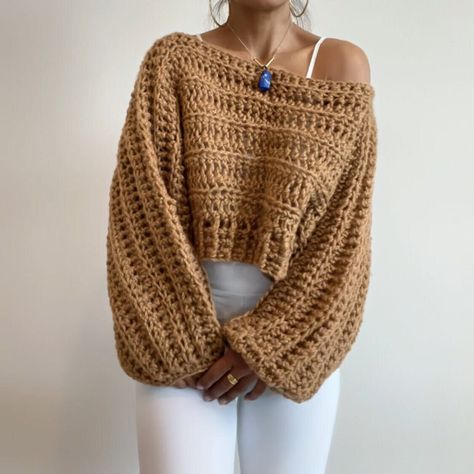 **READY TO SHIP** 📦 Chunky Super SOOOFFFFTTTT Crochet Crop Sweater Boho Relax Fit Off the Shoulder Crop Sweater The perfect sweater to throw on after a yoga / gym session to do errands Layer over a dress for cooler weather Super cute beach cover for breezy days Size : Large to Extra Large Approximate measurements 📐 Cuff to Cuff : 60 inches Top to Bottom : 14 inches Chest : 60 inches Colors : Golden Brown 🧶 Stitch by Stitch teaches patience and appreciation 100% HANDMADE by yours truly in a smoke free and pet free home studio Thank you for stopping by today! Many hugs ☺️ KeKe Please feel free to message me for more colors and sizes Custom Order ( please allow 1 week before shipping ) Care: Hand wash cold and air dry Vegan friendly. Perfect for those allergic to animal fibers Crochet Hollow Out Sweater, Off Shoulder Knitted Sweater, Crotchet Chunky Sweater, Handmade Crochet Sweater, Crochet Baggy Sweater Pattern Free, Crochet Sweater Women, Crochet Sweater Chunky Yarn, Crochet Sweater Cropped, Off Shoulder Crochet Sweater