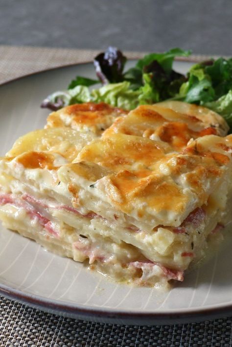 Chef John layers ham, potatoes, Cheddar, and a homemade cream sauce together in this easy, holiday-ready casserole that feeds a crowd. Holiday Ham And Potato Casserole, Cheese Potato Casserole, Ham And Cheese Casserole, Ham Casserole Recipes, Ham And Potato Casserole, Ham Dishes, Ham Dinner, Ham Potato, Ham Casserole