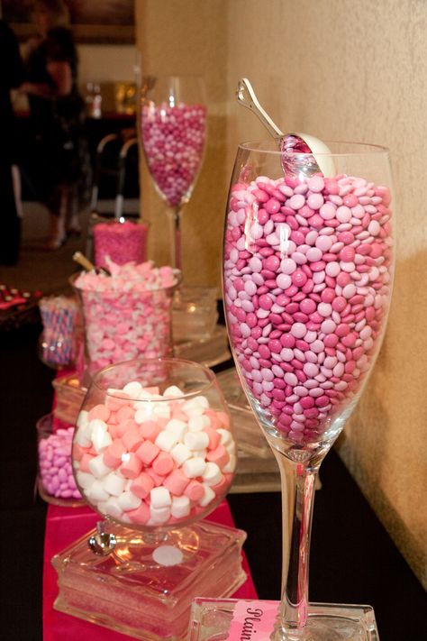 Love this candy bar. You can find those huge wine glasses at Home Goods. A reason to buy them now. Pink Party Decorations Classy, Candy Bar Ideas Pink, All Pink Candy Bar, Pink Themed Birthday Party At Home, Pink Party Favor Ideas, Pink Candy Bar Ideas, Pink Y2k Birthday Party, Everything Pink Party, 16 Shades Of Pink Party Ideas