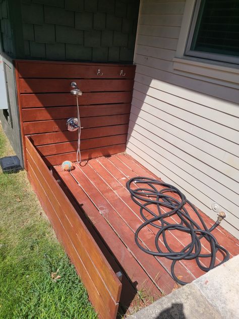 Dog washing station in our house - I like hot and cold water option, a shower handle Animal Washing Station, Outdoor Pet Shower Ideas, Dog Cleaning Station Outdoor, Dog Shower Station Outside, Outdoor Dog Paw Washing Station, Dog Outdoor Bath, Diy Dog Washing Station Outdoor Backyard, Dog Shower Outside, Diy Outdoor Dog Bath