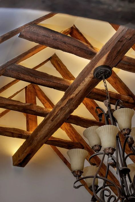 Essex Listed Farmhouse - Sam Coles Lighting Wooden Beams Ceiling Lighting, High Sealing Lighting Ideas, Exposed Beams Lighting, Led Tape Lighting Ideas, Uplighting Interior, Beams Lighting, Feature Chandelier, Pavilion Lighting, Truss Lighting