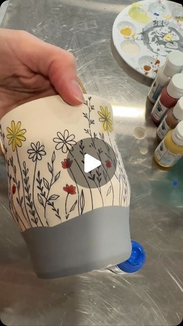 ClayShare on Instagram: "✨🌸✨Hand coloring a Ceramica Transfer wildflower design with Colors for Earth color concentrates! What are your favorite ways to add color to underglaze transfers? Learn how to make this cup shapes and to use underglaze decals with our classes on ClayShare! #madewithclayshare @ceramicatransfers @jessputnamphillips @ceramicsbypaula" Underglaze On Greenware, Pottery Underglaze Transfers, Pottery Underglaze Ideas, Underglaze Painting On Pottery, Hand Painted Pottery Ideas, Pottery Underglaze, Underglaze Designs, Surface Decorations, Cup Shapes