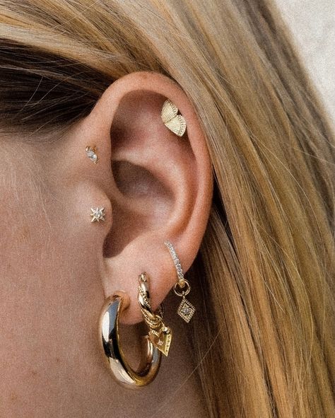 new ear stack inspo has entered the chat 💬✨ Two Ear Piercings, Desi Earrings, Unique Butterfly, Butterfly Wing Earrings, Multiple Piercings, Ear Stack, Synthetic Opal, Butterfly Wing, Left Wing