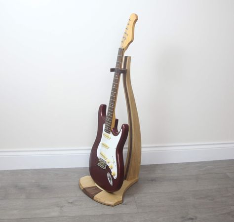 oak and walnut guitar stand handmade in the Uk Electric Guitar Stand, Wood Guitar Stand, Wooden Guitar Stand, Wooden Guitar, Guitar Stands, Oak And Walnut, Cheap Guitars, Guitar Stand, Guitar Hero