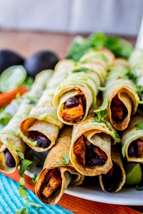 Sweet Potato Taquitos, Potato Taquitos, Vegan Superbowl Food, Super Bowl Essen, Black Bean And Sweet Potato, Vegan Super Bowl, Baked Taquitos, Bean And Sweet Potato, Sweet Potato Black Beans