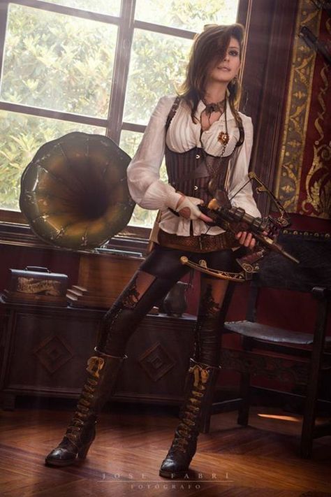 How to Recreate This Look: Steampunk Vampire Slayer Costume (white/brown/black color palette: blouse, underbust corset, leggings with cutouts, boots, necklaces, crossbow) - For costume tutorials, clothing guide, fashion inspiration photo gallery, calendar of Steampunk events, & more, visit SteampunkFashionGuide.com Steampunk Vampire Costume, Steam Punk Diy, Steampunk Vampire, Moda Medieval, Corset Steampunk, Mode Steampunk, Steampunk Couture, Arte Steampunk, Steampunk Women