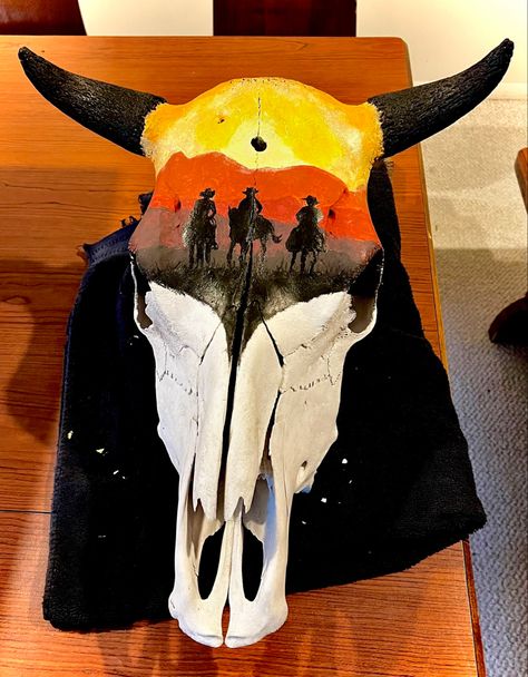 Bleached skull cowboy silhouette painting Bull Skull Painted, Painted Buffalo Skull, Painted Cow Skull Ideas, Painted Skull Ideas, Cow Head Painting, Cow Skull Painting Ideas, Bull Skull Art, Cow Skull Painting, Shady Hollow