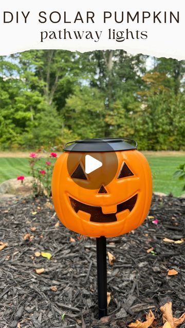 Courtney Hamilton on Instagram: "DIY solar pumpkin lights!  I used $1.98 pumpkin buckets and solar pathway lights for this project.  I made a small hole and cut a few slits in the bottom of the pumpkin and pushed the pathway light through it. (Make sure the hole is slightly smaller than the post to the light so the pumpkin doesn’t fall down). Stick in the ground and wait till you see how cute these are at night!  Remove the pumpkin after Halloween and use the pathway lights year round.  Comment PUMPKIN and I’ll message you the links to items I used.  Thanks for this great idea @kelsimsavage 🎃 #diy #halloween #halloweendiy #pumpkins #halloweendecor #falldecor #outdoorlighting #fall #falldecor #outdoor #halloweenideas 

Follow my shop @athomewiththehamiltons on the @shop.LTK app to shop thi Diy Lighted Outdoor Halloween Decorations, Pumpkin Yard Decorating Ideas, Pumpkin Decoration Outdoor, Plastic Pumpkin Over Solar Lights, Pumpkin Lights Outside, Pumpkin Pathway Lights, Solar Halloween Decorations, Diy Outdoor Solar Lights, Halloween Pumpkin Solar Lights