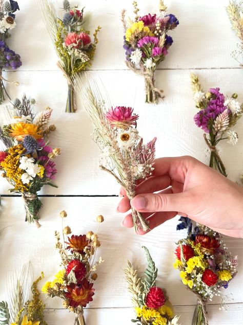 Delicate small organic dried flower bouquets in different color schemes made for you to use as:  Gifts for her, Home Decor, Bud vases, Wedding Favors, Gift Wrapping, Wall Art, Table Settings, Party favors and so much more!  They are made out of natural, long-lasting dried flowers, wildflowers, and grasses.  💐 Comes in a set of 3!  📏Measurements: 13cm x 6cm ; 5-6 inch x 2-3 inch ( For some styles they might slightly vary)  ☀For more colors, flowers, bouquets, crafts, and more visit - https://ri Gifts For Guests Wedding, Dried Flower Bouquets, Princess Party Favors, Gifts For Guests, Handmade Wedding Favours, Fleurs Diy, Flowers Bouquet Gift, Wildflower Bouquet, Bridesmaid Proposal Gifts