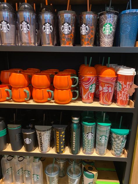 shelf cups starbucks mugs straw bottle colourful pumpkin fall autumn aesthetic Fall Starbucks Cups, Starbucks Cup Aesthetic, Autumn Wishlist, Aesthetic Mugs, Autumn Cup, Cups Starbucks, Fall Autumn Aesthetic, Pumpkin Cups, Gold Wallpaper Iphone